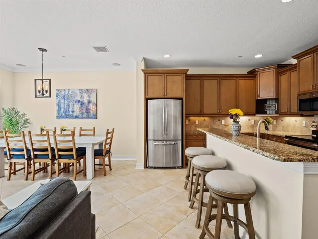 The kitchen offers great availability to the family room for entertaining.