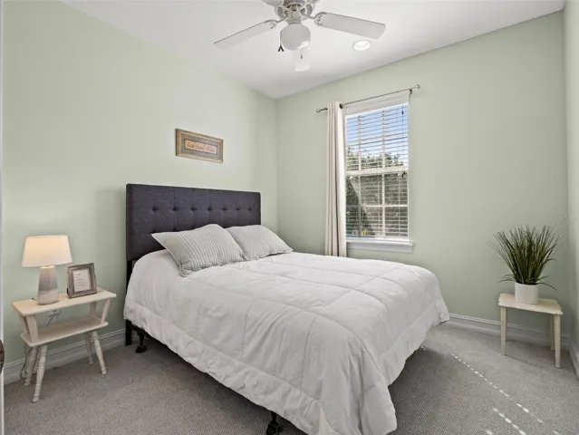 Second bedroom with luxurious carpet.