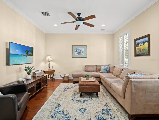 Front living room with wood flooring.