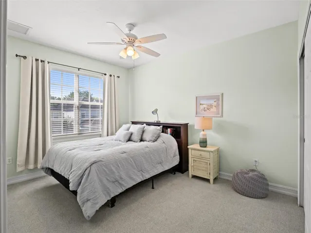 Third bedroom with luxurious carpet.