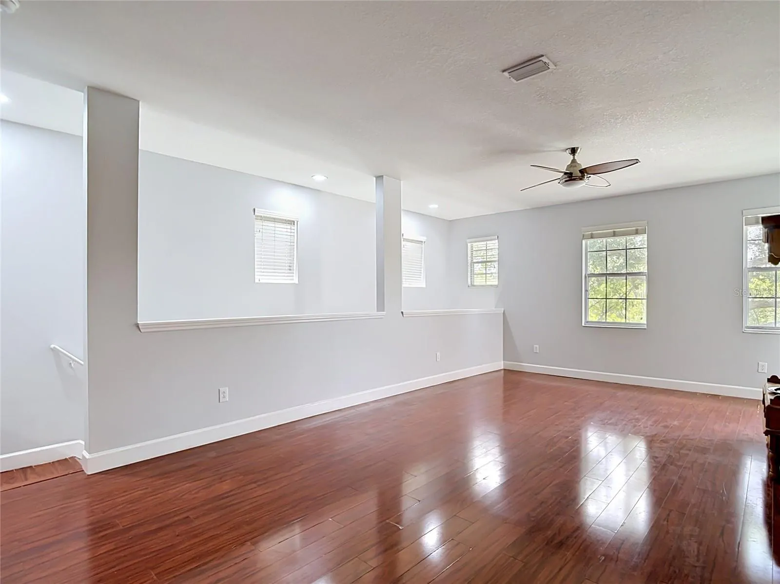 9502 W Park Village 108, Great room, front entry stairwell to left