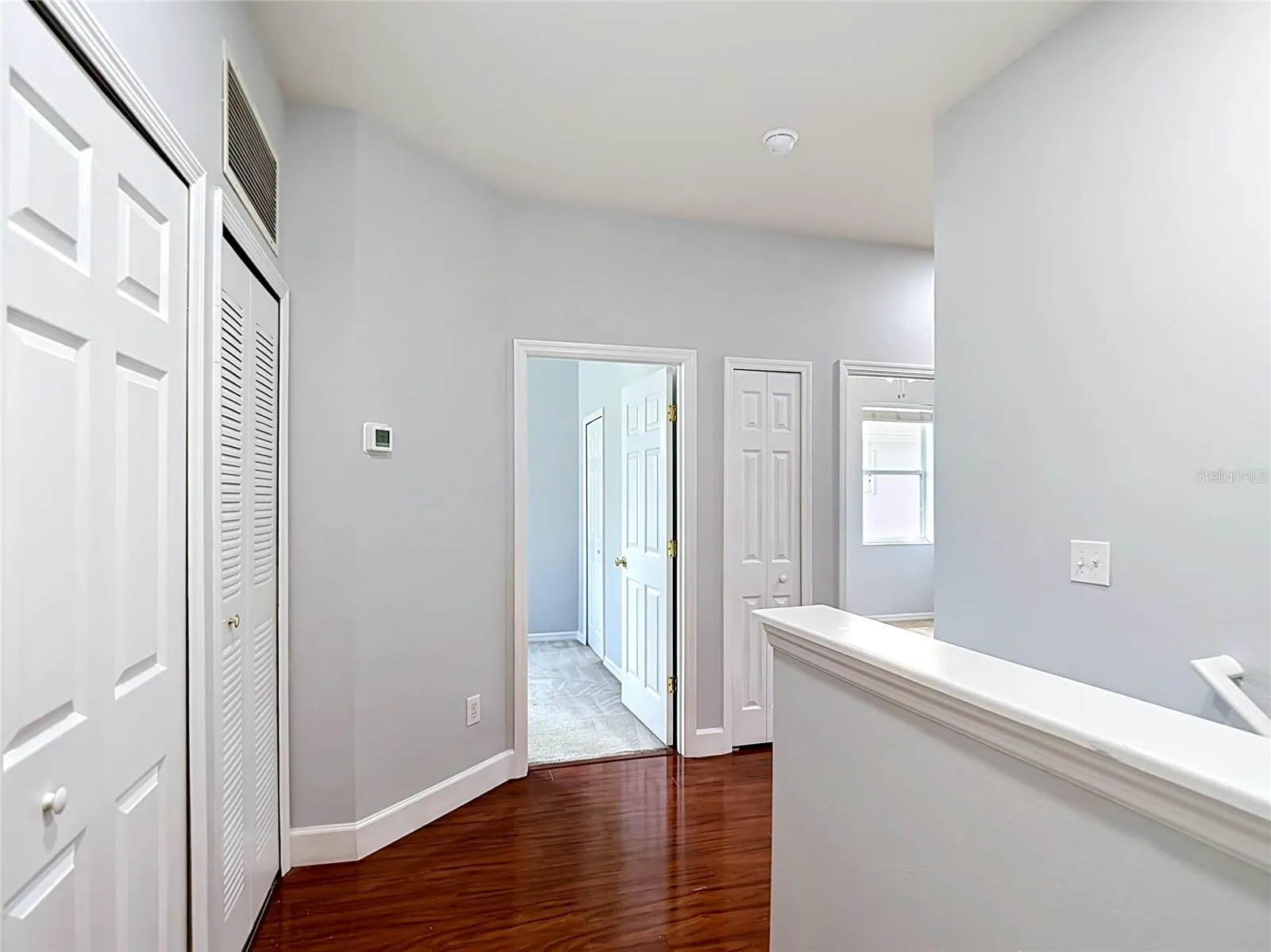 9502 W Park Village 108 hallway access to laundry and 2nd and 3rd bedrooms