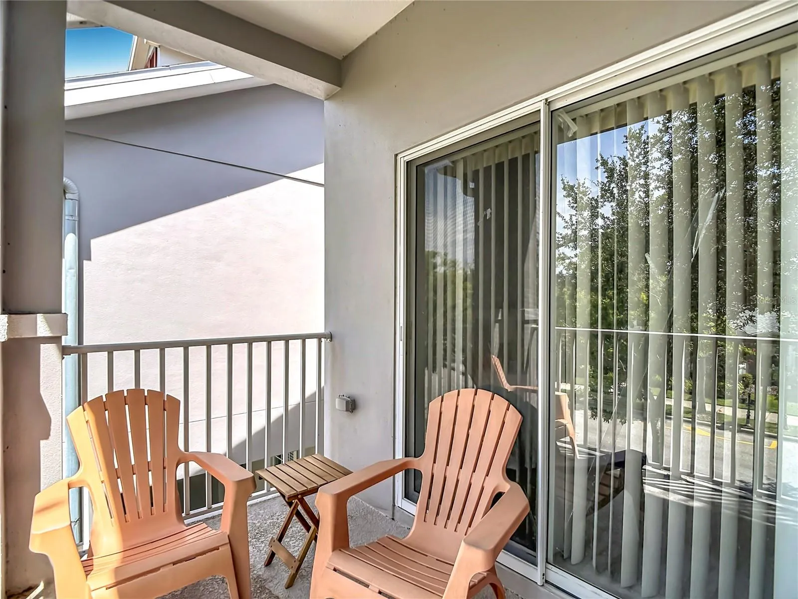 9502 W Park Village 108 private balcony, sliders to primary suite
