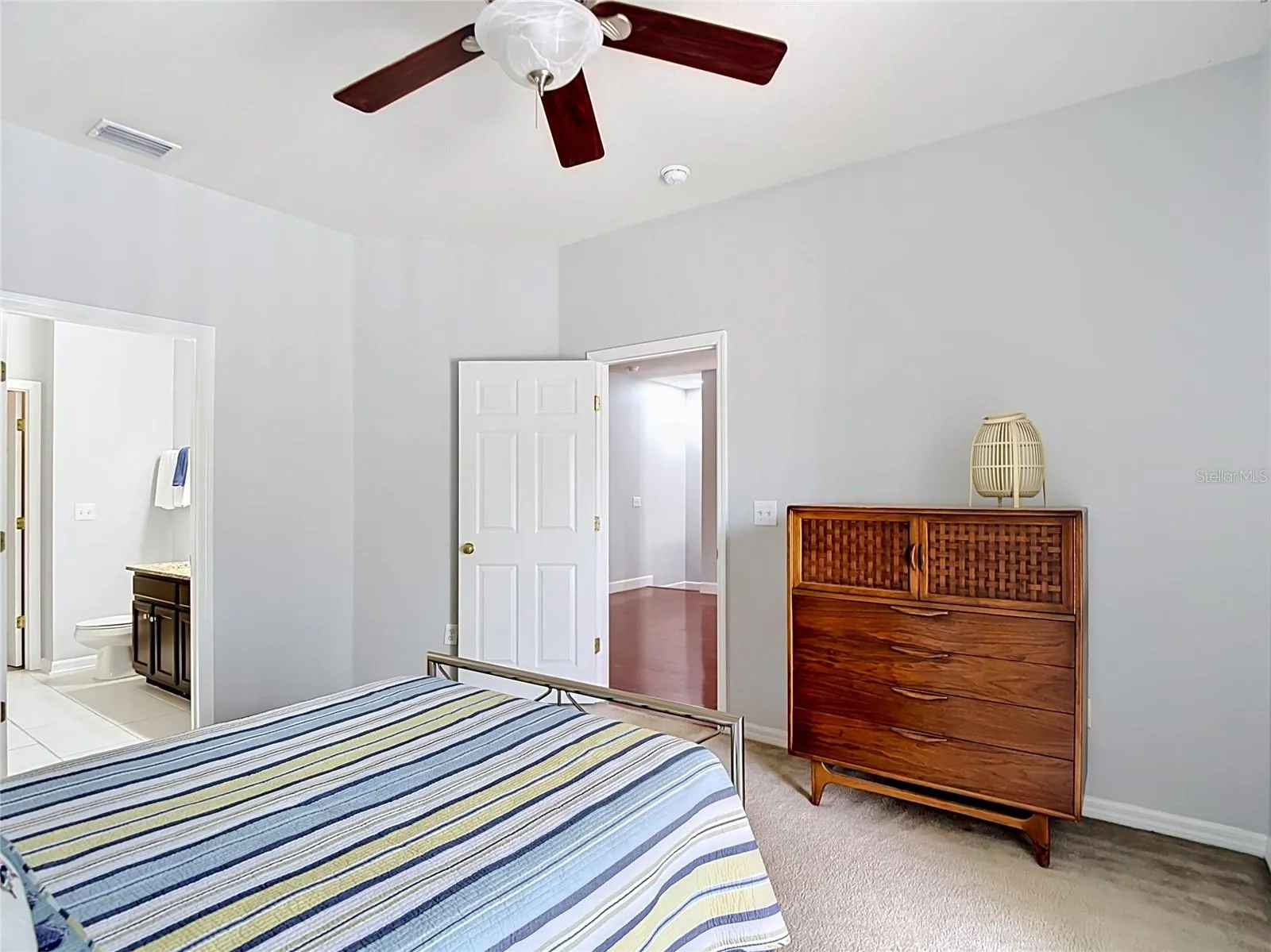 9502 W Park Village Dr 108, Primary suite, view toward great room, ensuite bath to left