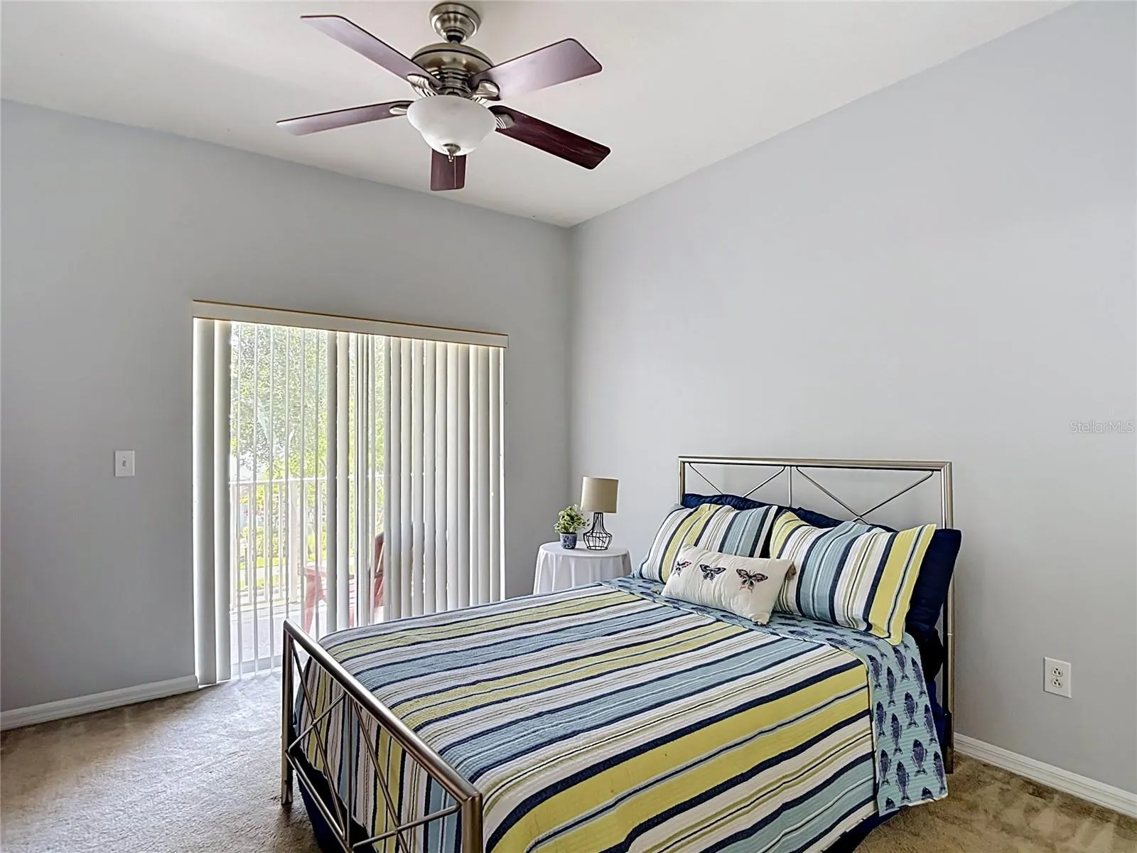 9502 W Park Village 108,primary bedroom, sliders to balcony
