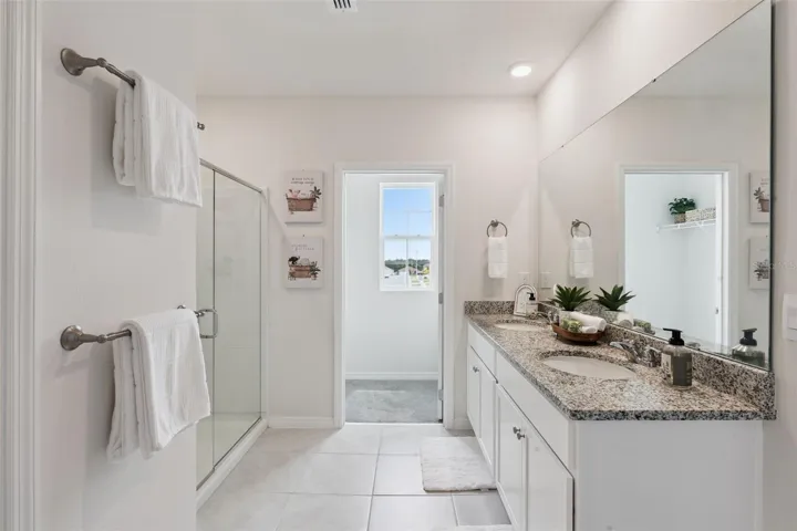 Dual sinks and walk in shower. Did I mention there's two closets!!
