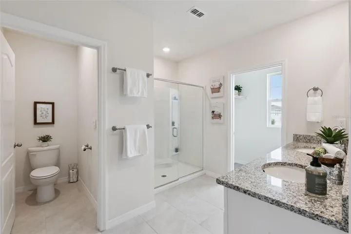 Owners bath with private water closet