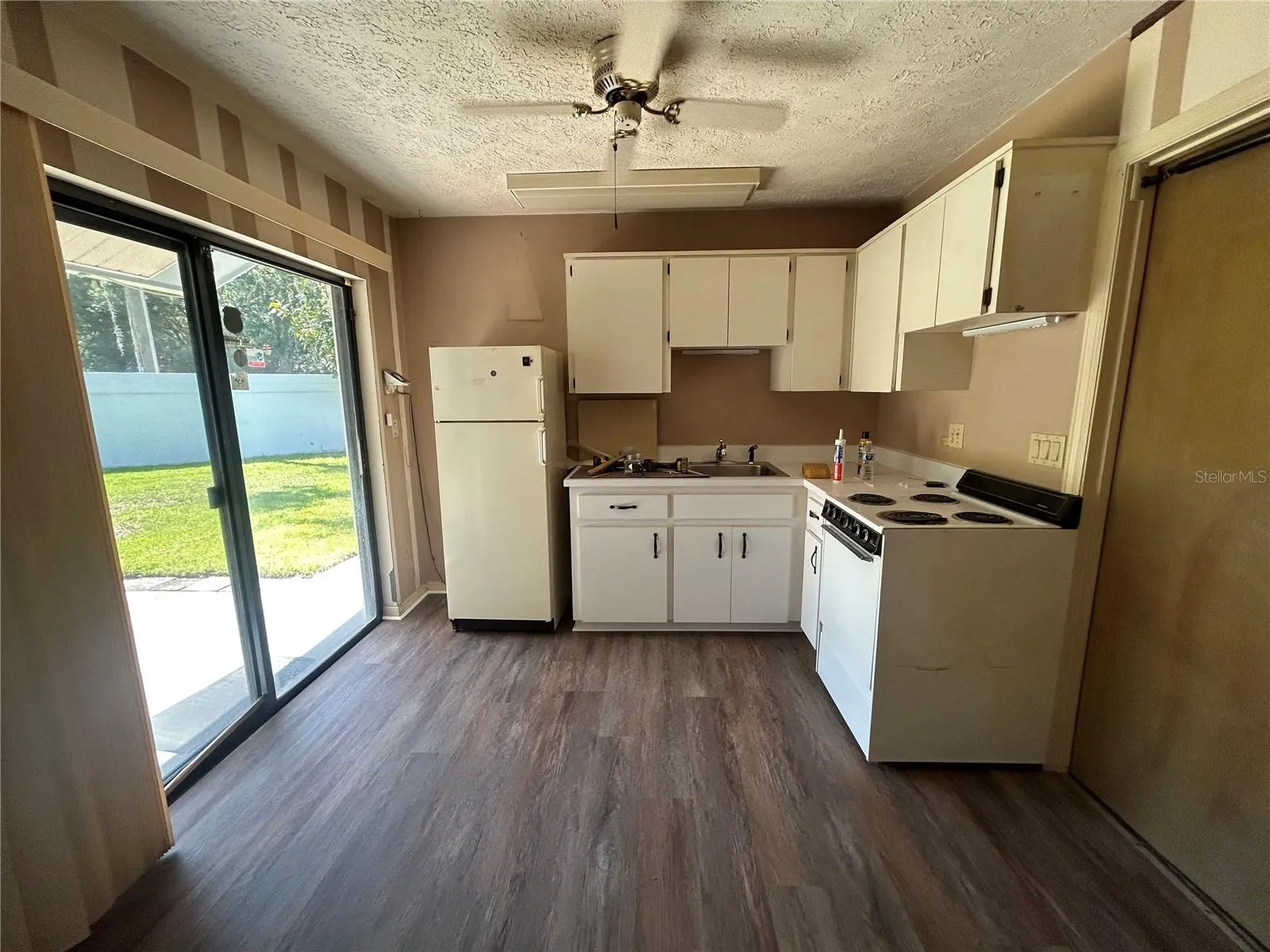 Same kitchen as previous but with new flooring