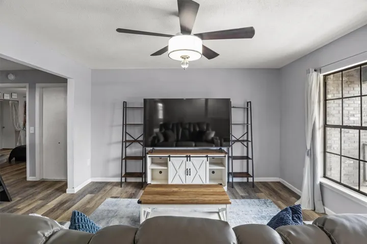 view of living room, with view of primary room