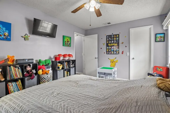 bedrooms three. Located at the end of hallway. Walk in closet.