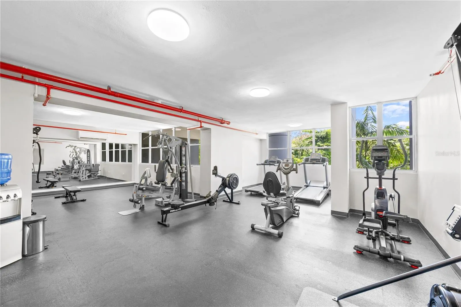 Spacious and fully equipped gym for your daily workout routine.