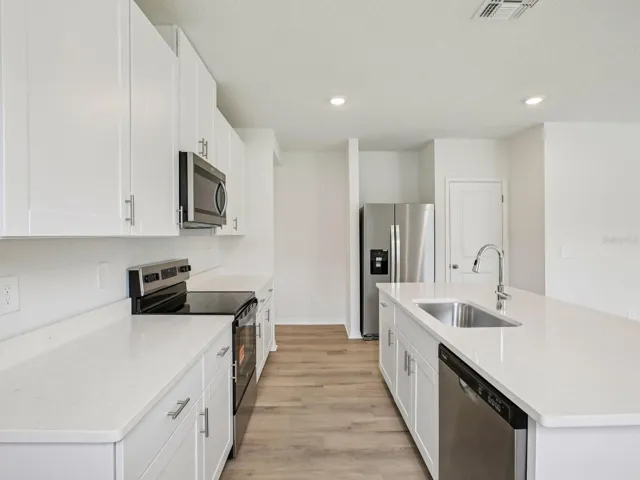 Interior photos are not of the actual home but are photos of the builder home with the same floorplan with similar interior finishes and features.