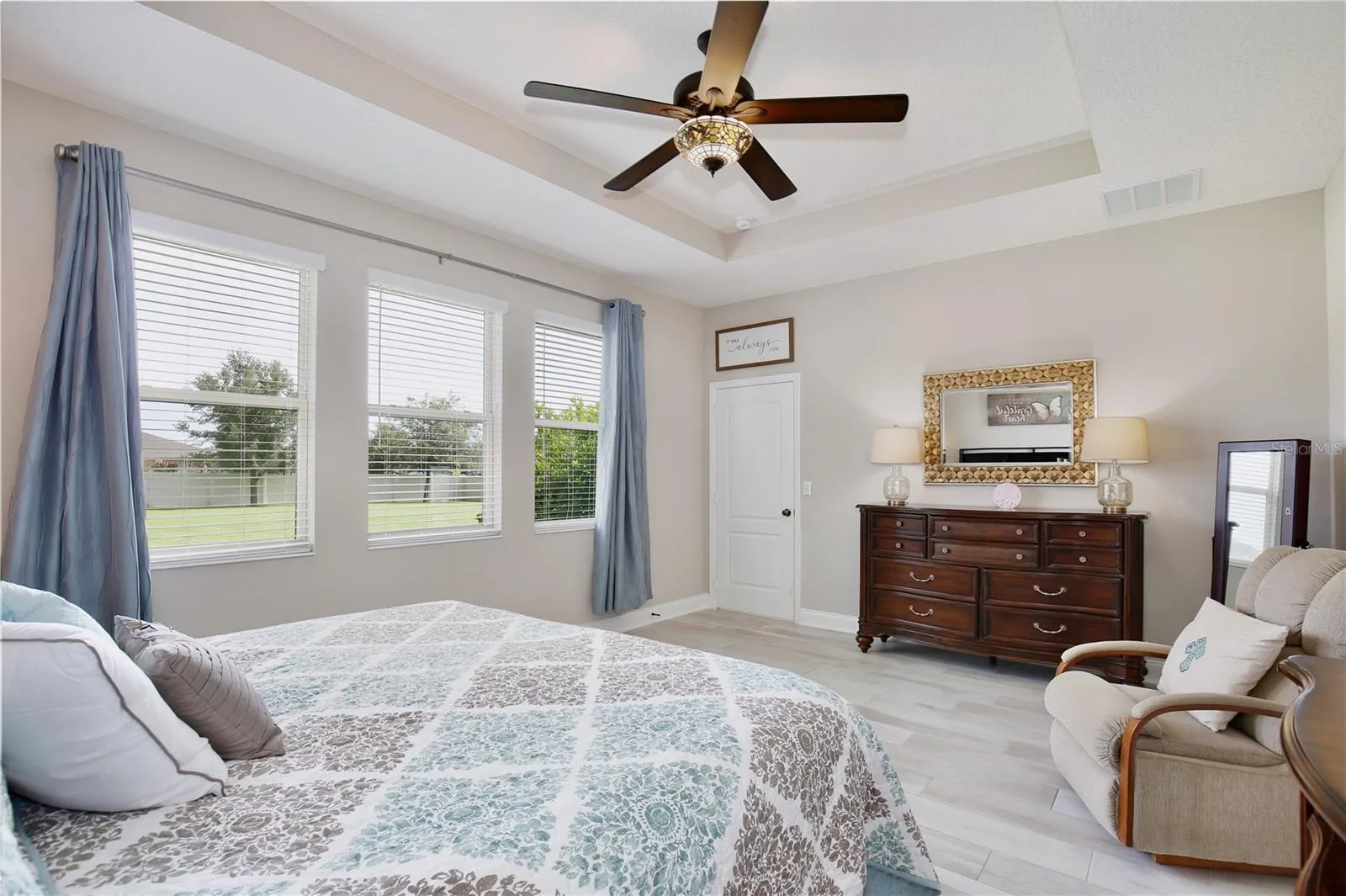 PRIMARY BEDROOM WITH LOTS OF NATURAL LIGHT