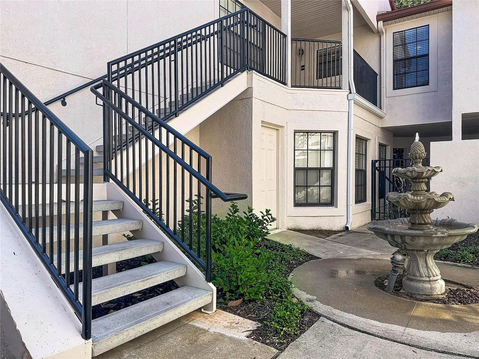 Stairs leading to the condo