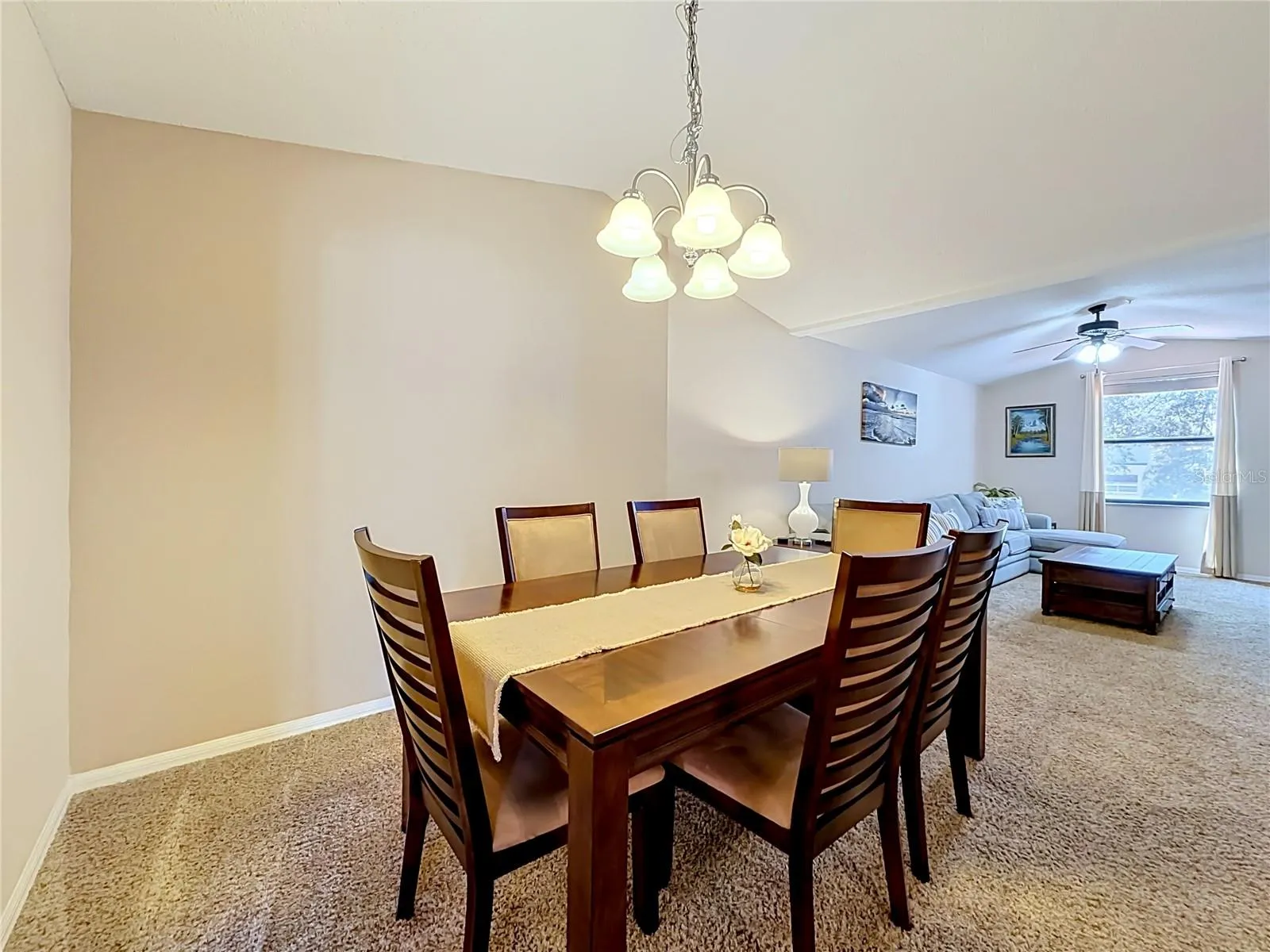 Dining area open to the living room and kitchen