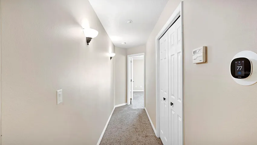 hallway to primary bedroom