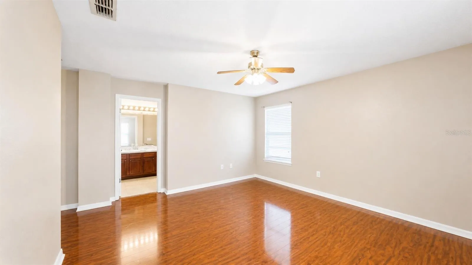Primary bedroom has an ensuite bathroom with a walk-in closet.