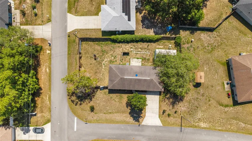 .27 Acre Lot with fenced yard.