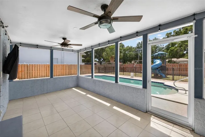 Fully screened in sunporch off of the Primary