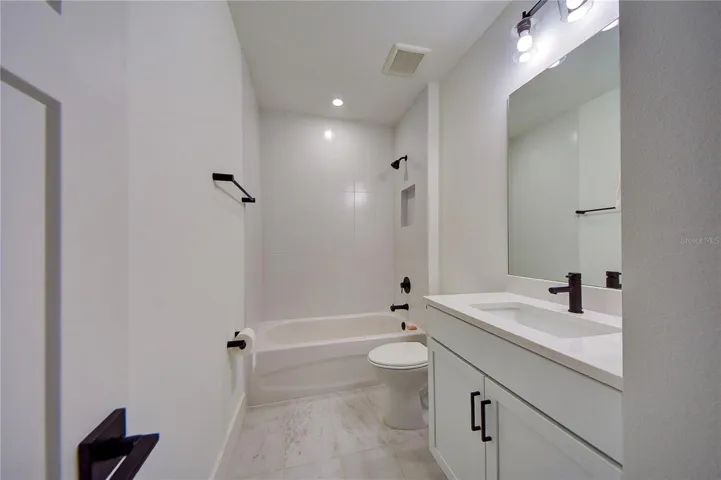 Full Guest bath inside bedroom 2