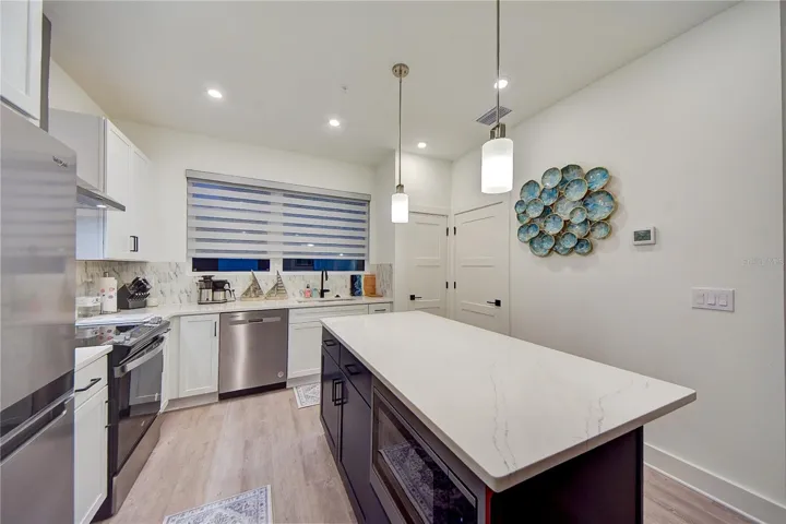 Kitchen w/Island and 1/2 bath