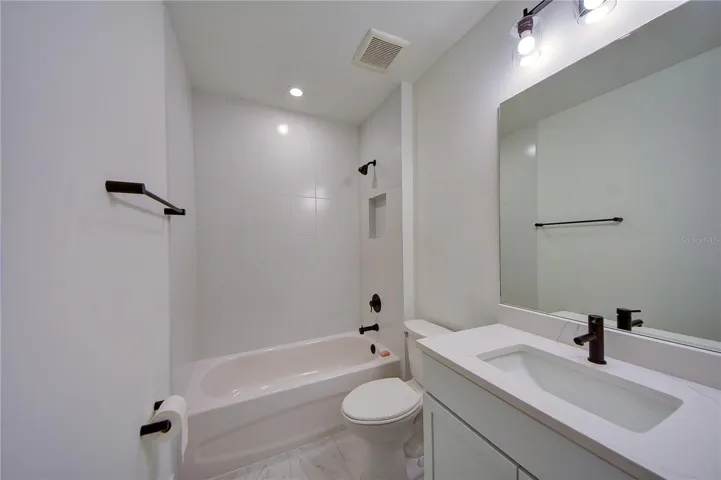 Full Guest bath inside bedroom 2