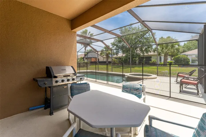 cover rear porch within screened lanai