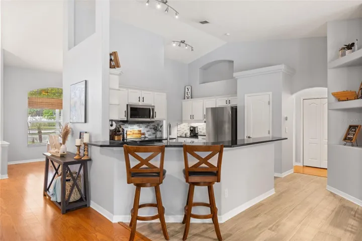 Upgraded kitchen with breakfast bar.