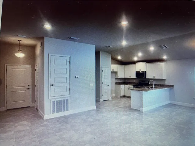 Under construction. This is a pic of a completed home in another location. Colors and options may vary.