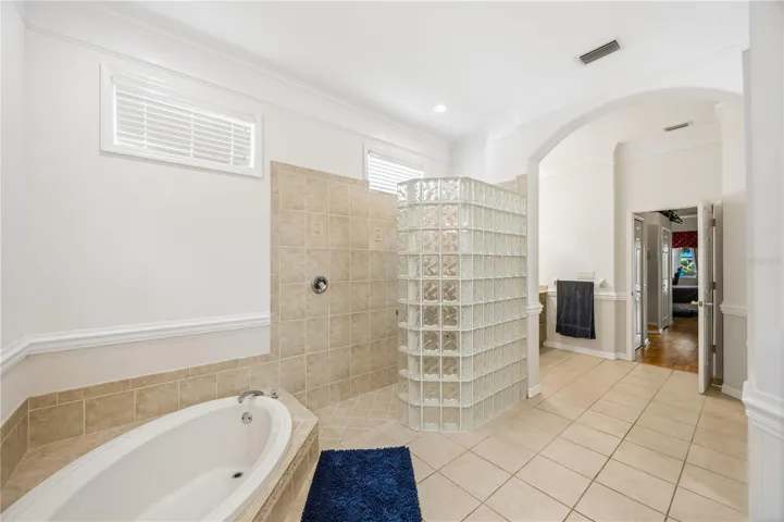 Master tub and Roman shower