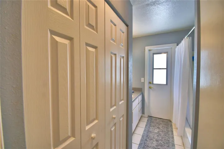 Hall/Guest Bath that leads to the pool area