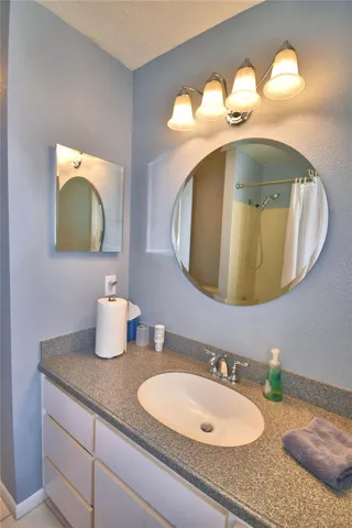 Hall/Guest Bath that leads to the pool area