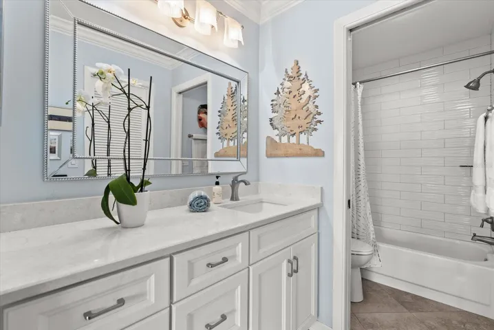 New Primary Bathroom with custom tile work.