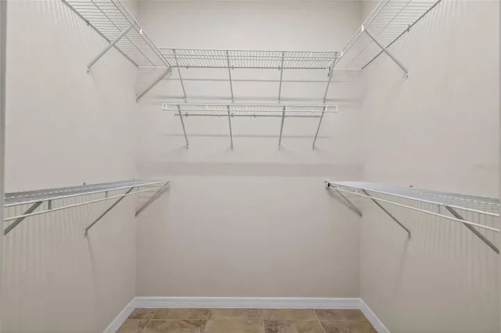 Primary Bedroom First Walk-In Closet