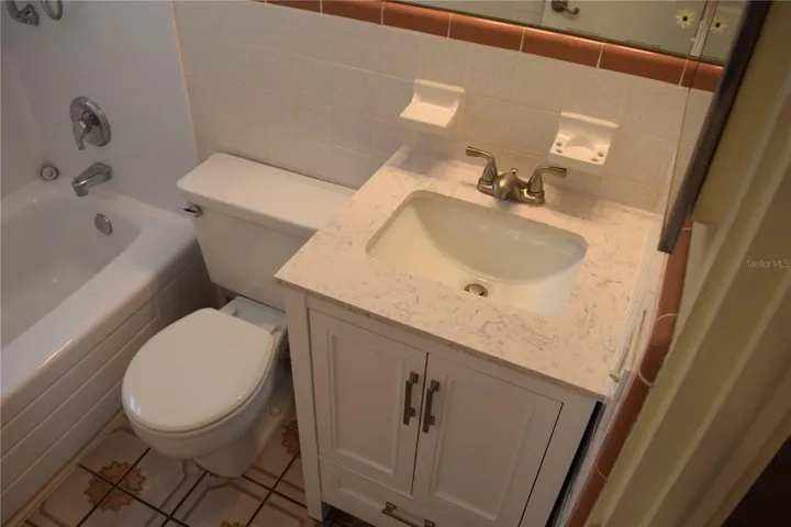 Downstairs hall linen closet