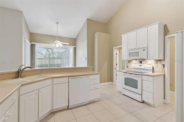 Kitchen overlooking eating area
