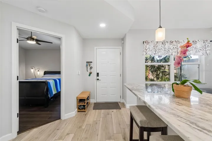 Entry way with bedroom off the kitchen