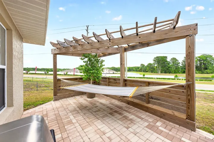 The Paver patio with trellis.