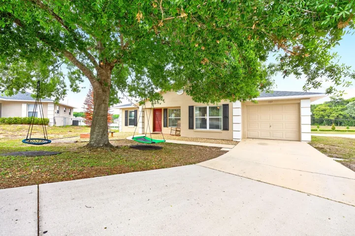 Welcome to this BEAUTIFULLY MAINTAINED 3-bedroom, 2-bath home in the peaceful Magnolia Ridge community of Tavares, where comfort, thoughtful upgrades, and outdoor living come together perfectly.