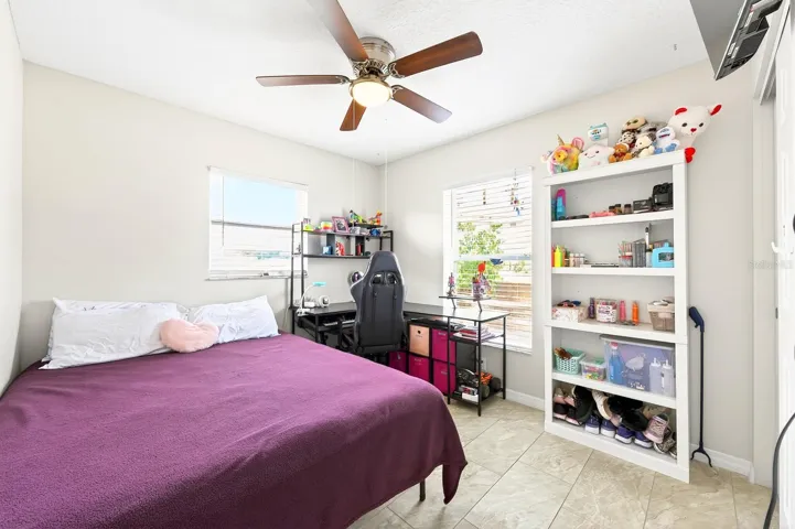 Bedroom 2 is perfectly sized for use as a guest bedroom, home office or hobby space.