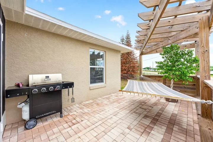The Paver patio with trellis.