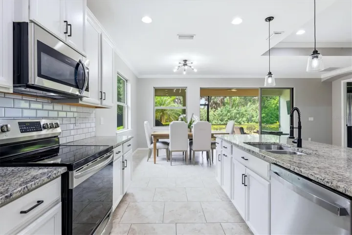 Kitchen with preserve views
