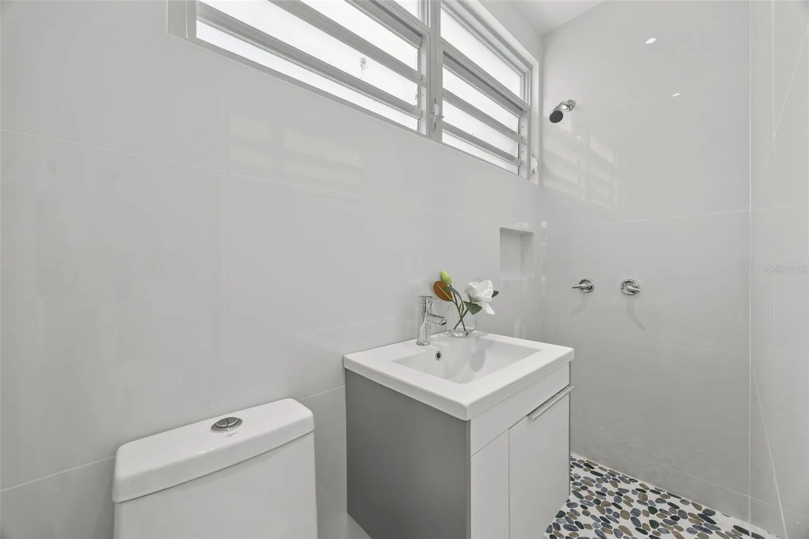 In-Law's bathroom attached to primary bedroom