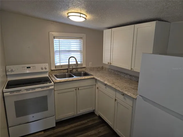 Kitchen featuring new Refrigerator