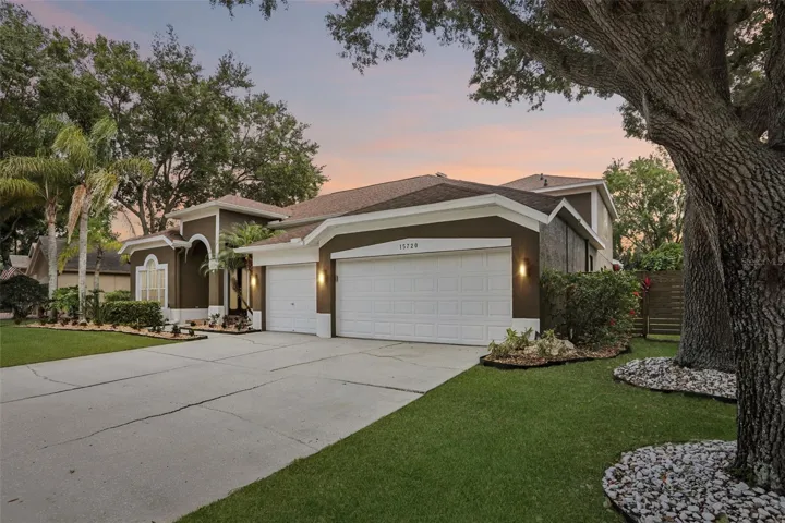 Generous 3 Car Garage and Mature Oaks