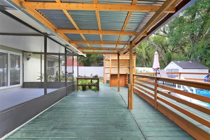 Covered Exterior Deck/Walkway and Bar