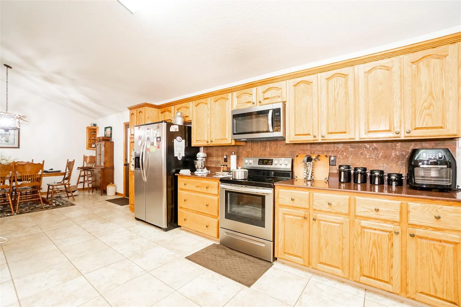 Durable solid wood cabinetry with extensive prep and storage space