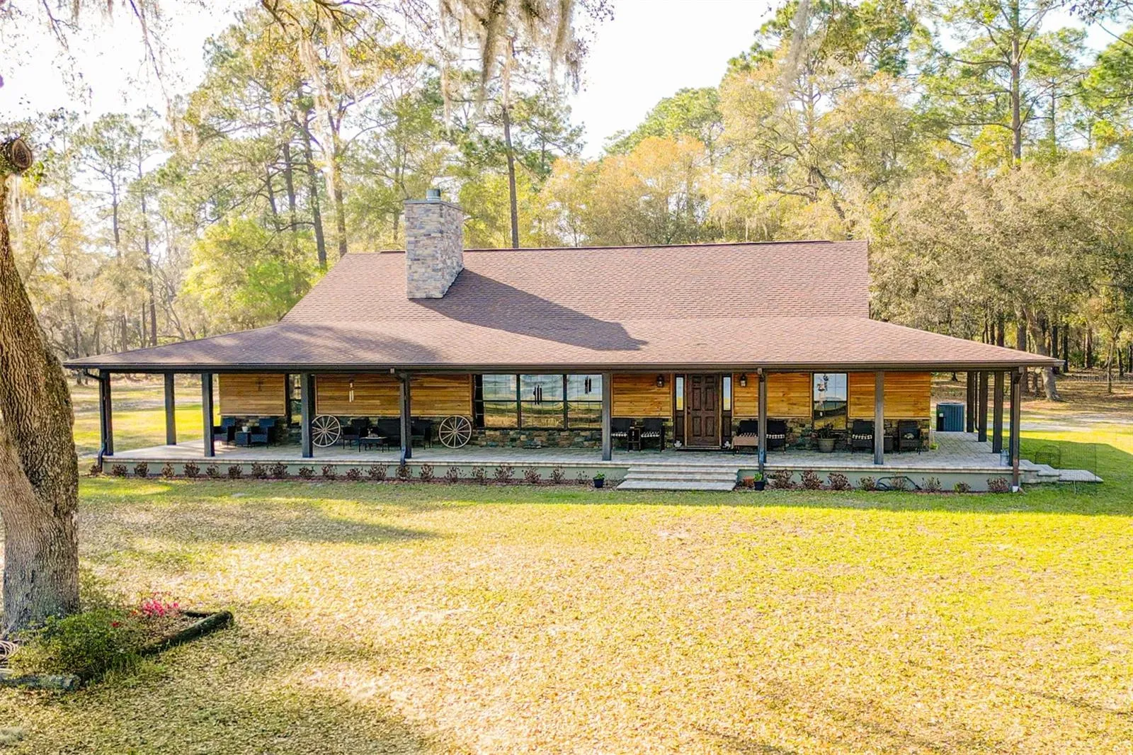 Executive lodge-style estate positioned on nearly 10 private acres
