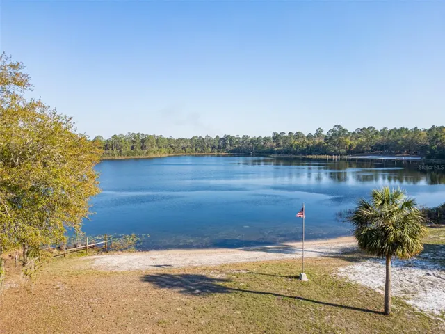 Over 150 feet of private Lake Fore shoreline