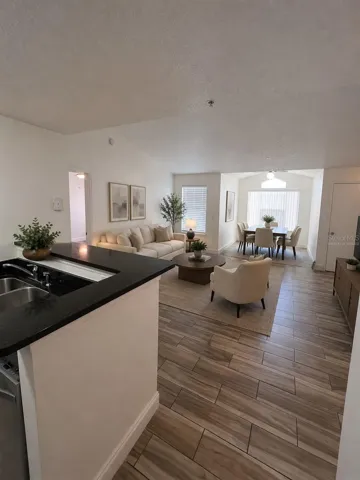 The  photos have been virtually staged and/or digitally enhanced using AI for marketing purposes only. Furniture, décor, and other staged items shown in the images are not included with the sale or lease of the property.
